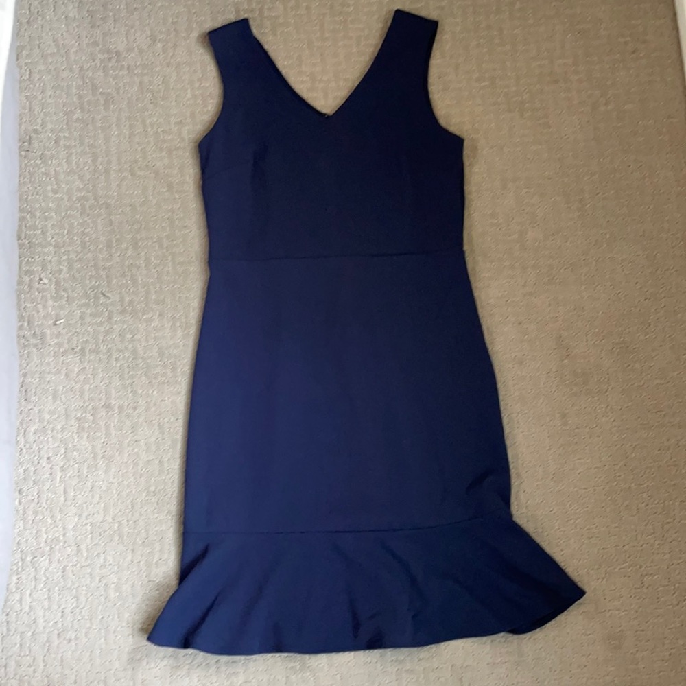 Navy dress with flutter hem